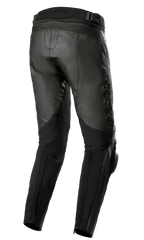 Pantalones de cuero Alpinestars Missile V3, negros, vista trasera, con zonas de estiramiento de cuero tipo acordeón en la cintura y detrás de las rodillas, marca Alpinestars grabada en relieve y construcción de cuero resistente para carreras en carretera.