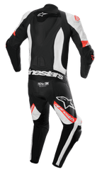 Alpinestars Missile V2 Ward 1-Piece Leather Suit, mono de moto, negro, blanco y rojo fluorescente, vista trasera con joroba aerodinámica, logotipo Tech-Air Ready en la parte inferior de la espalda, zonas elásticas de acordeón y logotipos de Alpinestars destacados en las piernas y la espalda