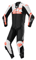 Alpinestars Missile V2 Ward, mono de cuero de una pieza para moto, negro con detalles en blanco y rojo flúor, diseño aerodinámico con cremallera frontal y deslizadores en las rodillas, confección en cuero de primera calidad