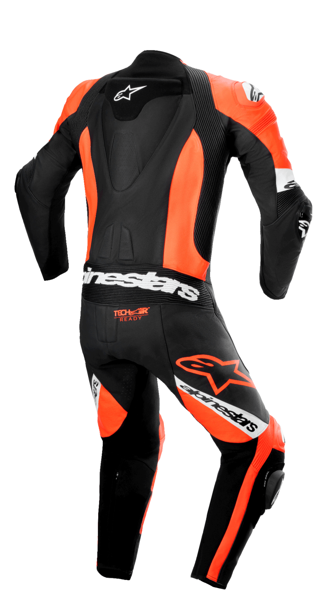 Mono de cuero de una pieza Alpinestars Missile V2 Ward, vista trasera, negro y rojo flúor con detalles blancos, con joroba aerodinámica, paneles elásticos de acordeón en la zona lumbar y las rodillas, logo 'Tech-Air Ready' y marca Alpinestars destacada para competición profesional en pista.
