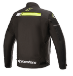 Chaqueta impermeable Alpinestars T-SP S Ignition, chaqueta de moto textil, negro y amarillo flúor, vista posterior con una franja horizontal amarillo neón en la parte superior de la espalda, logotipo blanco de Alpinestars en la cintura y pequeño logo de estrella amarilla en el cuello