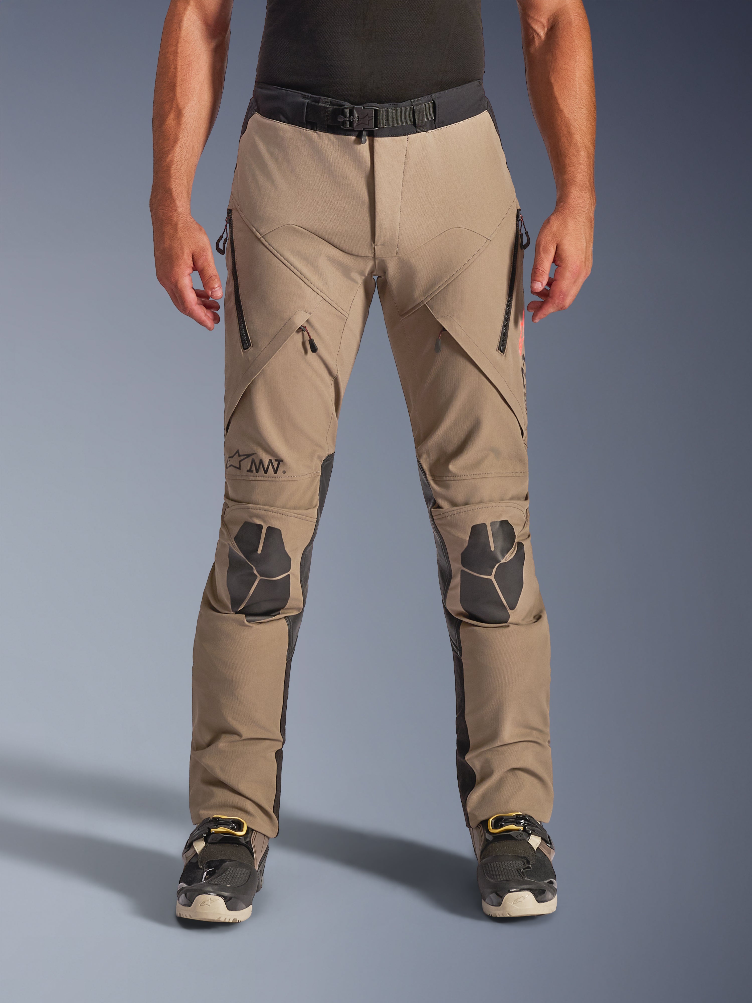 Alpinestars AMT-8 Stretch Drystar® XF Pants, Walnut Black motorcycle adventure pants, featuring zippered thigh vents, black reinforced knee panels, and magnetic waist closure, designed for high-performance adventure touring.