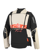 Chaqueta laminada Alpinestars Halo Pro Drystar® XF, vista posterior, construcción textil en negro Mastic y crema, logotipo 'stars' rojo llamativo en el centro, cremalleras verticales dobles para ventilación modular, prenda técnica de aventura para motociclismo