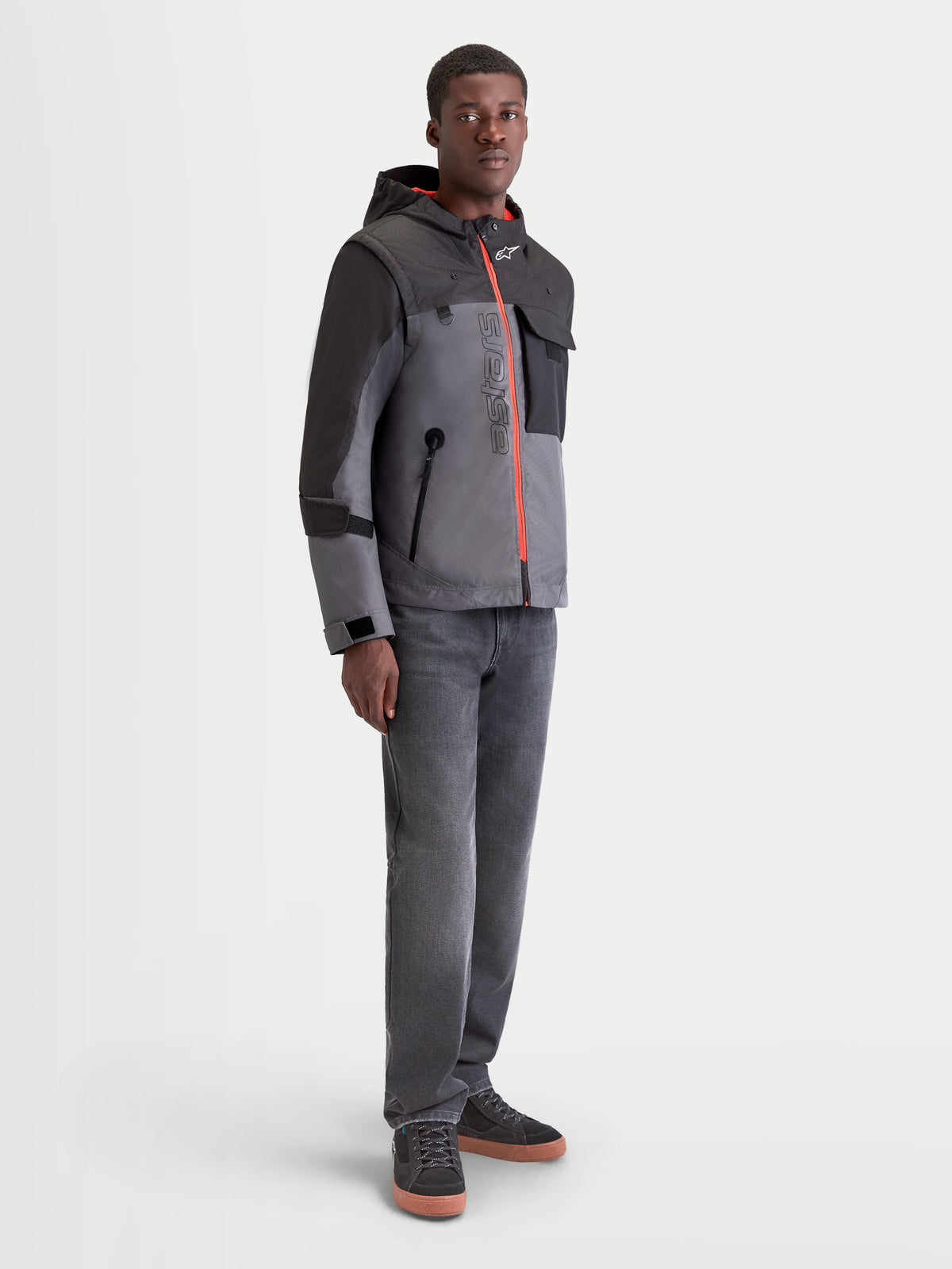 Alpinestars Morfex Parka Waterproof Jacket, men's urban contemporary motorcycle textile jacket in lunar gray and black, full-length on-model view showing modular parka design and waterproof construction.