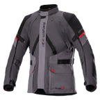 Alpinestars Monteira Drystar XF Jacket, Motorcycle Touring Jacket, Dark Gray and Tar Gray with Black panels and Bright Red accents, featuring front cargo pockets, adjustable waist and arm straps, vertical Alpinestars branding, and a high collar, designed for adventure riding