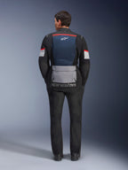 Alpinestars Andes Air Drystar Jacket, Deep Blue Black Ice Gray, rear view on model, featuring blue mesh back panel for ventilation, large gray lower pocket, red and white sleeve accents, 'alpinestars' wordmark, paired with black motorcycle pants for a complete touring outfit