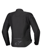Alpinestars Stella T-Jaws V4 Waterproof Jacket, chaqueta de moto textil para mujer, negro sobre negro, vista posterior que muestra la silueta deportiva ergonómica, detalles reflectantes y el logotipo en la parte inferior de la espalda.