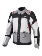 Alpinestars Stella Andes V4 Drystar, chaqueta de aventura para mujer, gris y negra con detalles coral, textil impermeable.