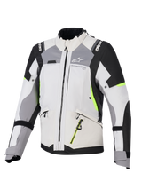 Chaqueta Alpinestars Stella Andes V4 Drystar® para mujer, chaqueta de turismo de aventura para mujer, gris hielo y gris oscuro con detalles en negro y amarillo flúor, construcción textil duradera con cremalleras impermeables y logotipos de Alpinestars, vista frontal