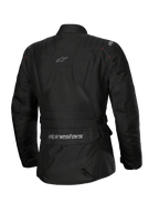 Chaqueta impermeable Alpinestars Stella ST-1, chaqueta de moto para mujer, negra, vista trasera con un gran bolsillo de carga en la parte inferior de la espalda con logo, diseño de turismo de aventura con marca sutil en la parte superior de la espalda, confección textil impermeable y duradera.