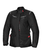 Alpinestars Stella ST-1 Waterproof Jacket, chaqueta de moto de turismo para mujer, negra con detalles rojos, cuello alto, cremallera frontal, grandes bolsillos de carga en la cintura, correas ajustables en cintura y puños, construcción resistente a la intemperie