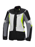 Alpinestars Stella ST-1 Waterproof Jacket, chaqueta de moto de turismo para mujer, gris hielo, negro y amarillo fluorescente, con cuello alto, cremallera frontal, hombros reforzados con el logo de la marca y correas de cintura ajustables, diseño inspirado en el turismo de aventura