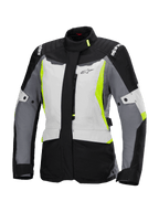 Alpinestars Stella ST-1 Waterproof Jacket, chaqueta de moto de turismo para mujer, gris hielo, negro y amarillo fluorescente, con cuello alto, cremallera frontal, hombros reforzados con el logo de la marca y correas de cintura ajustables, diseño inspirado en el turismo de aventura