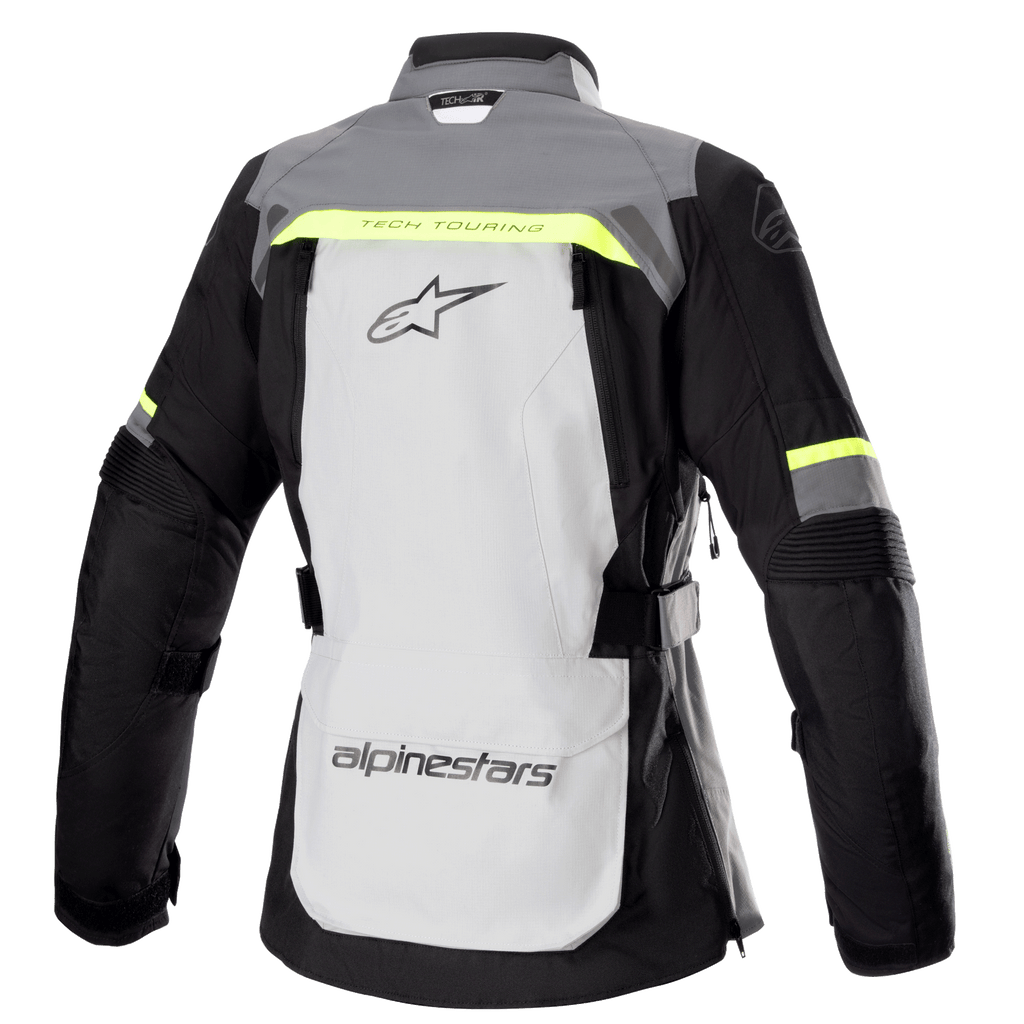Alpinestars Women Stella Bogota' Pro Drystar® Jacket, Rear View, Ice Gray and Dark Gray with Fluorescent Yellow accents, features a large back logo, 'Tech Touring' text, vertical ventilation zippers, and reinforced accordion panels on the elbows.