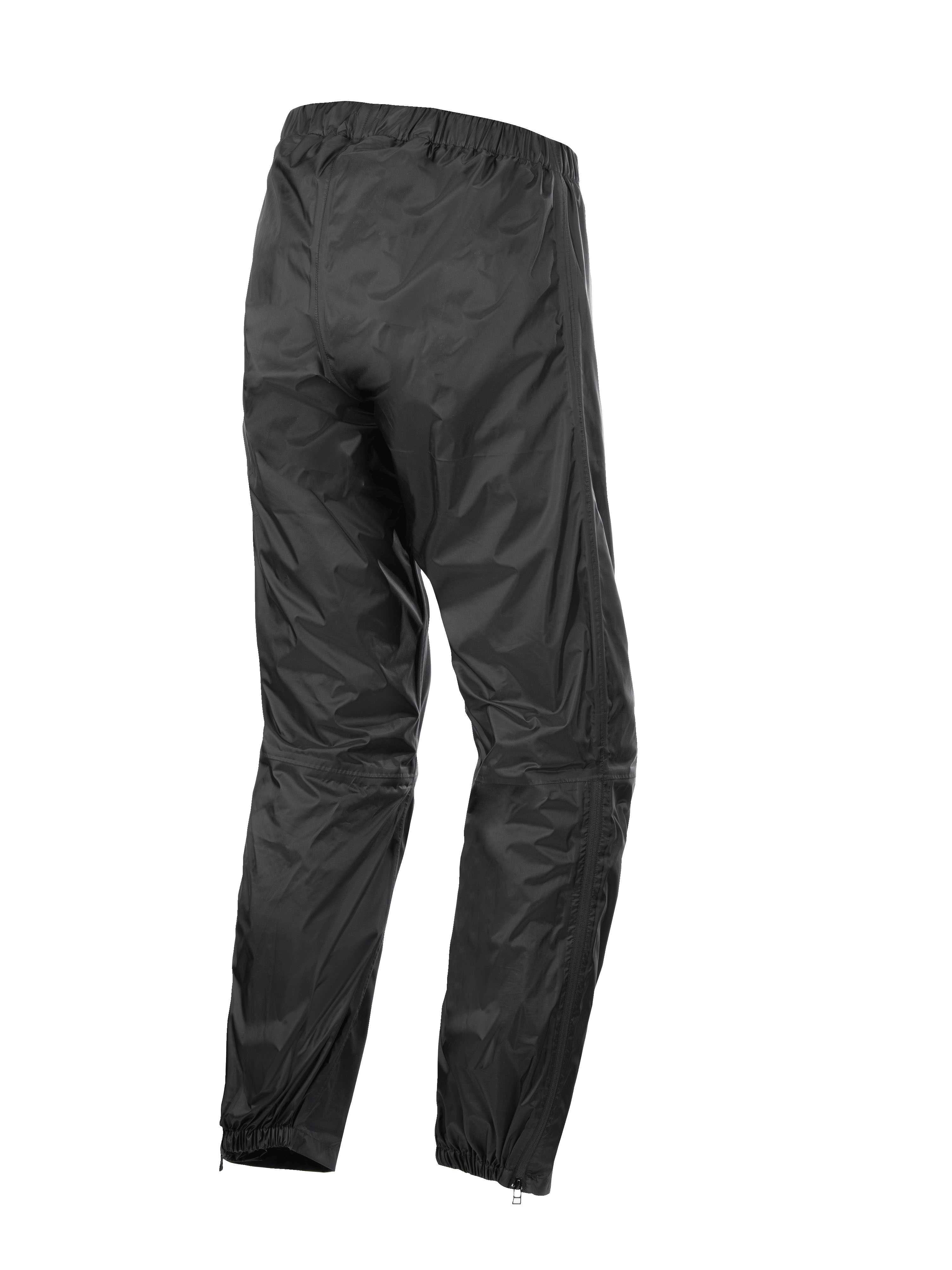 Pantalones Alpinestars Hurricane Rain V2, sobrepantalones impermeables para moto, negros, vista trasera que muestra la cintura y los puños elásticos, tejido laminado ligero y resistente al viento con cremalleras en la parte inferior de la pierna para un fácil acceso a las botas, equipo de protección para touring de carretera y aventura