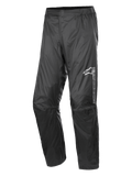 Alpinestars Hurricane Rain V2 Pant, pantalones impermeables para moto, negro, con logotipo reflectante en el muslo izquierdo, cintura elástica, diseño ergonómico en la rodilla y tejido laminado brillante resistente al viento para uso en carretera y turismo de aventura