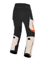 Alpinestars Harok Pro Drystar® XF Laminated Pants, adventure motorcycle touring pants, men's textile trousers, Mastic Black and beige with red accents, rear view showing 3L stretch ripstop construction and CE-certified protection features