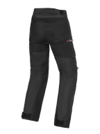 Alpinestars Andes V4 Drystar® Pants - Long, pantalones de moto adventure-touring negros, vista trasera que muestra el chasis textil duradero, correas ajustables en los tobillos y sutil marca Drystar en rojo
