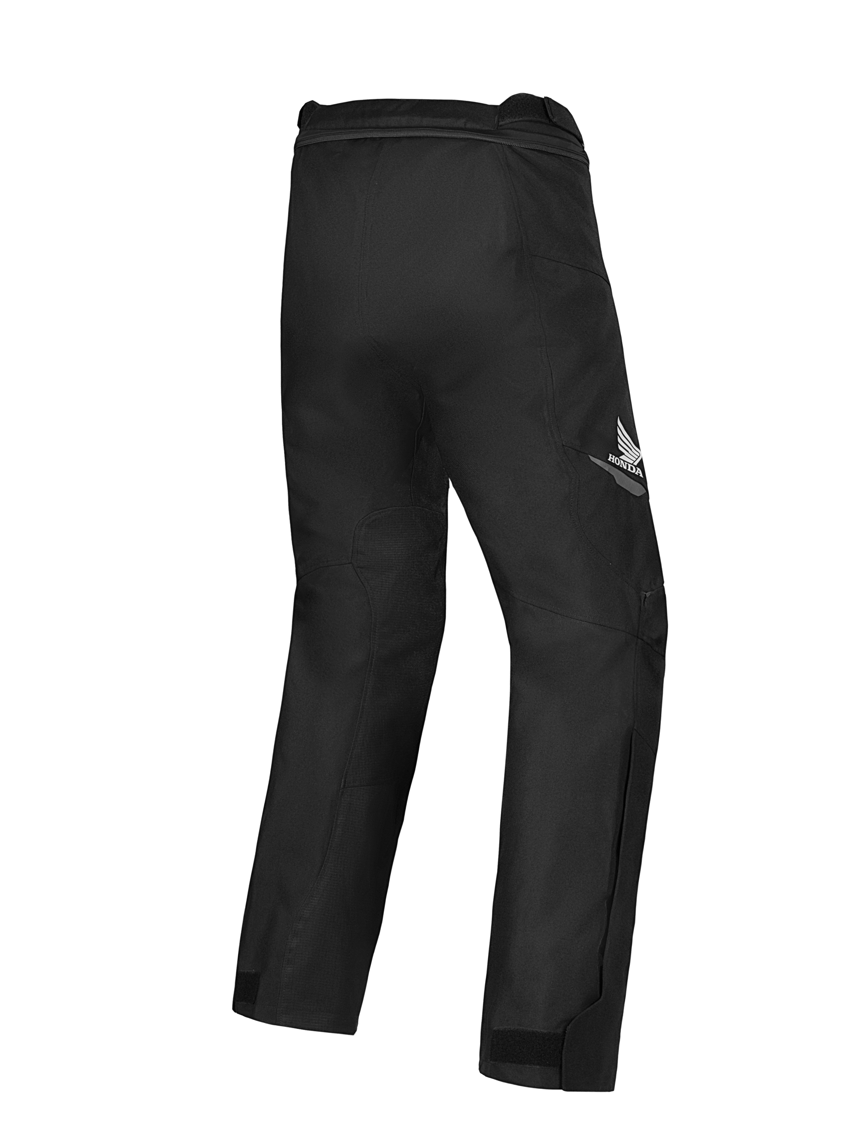 Alpinestars Honda ST-1 Waterproof Pants, pantalones de touring para moto, negros, vista trasera que muestra el logo del ala de Honda en el muslo, diseño textil aerodinámico con movilidad ergonómica y cremallera de conexión en la cintura