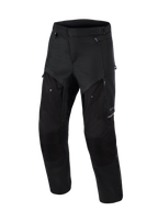 Pantalones Alpinestars Cusco Drystar®, pantalones de motociclismo adventure, negros, vista frontal, con paneles de ventilación con cremallera en los muslos, construcción textil ripstop duradera y diseño ergonómico para carretera y adventure touring