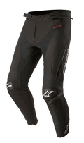 Alpinestars T-SP R Drystar Pants, pantalones de moto sport-touring de textil negro, con rodilleras reforzadas y logos de estrella blancos, marca Drystar roja en la cadera, ventilaciones con cremallera en los muslos y cintura con hebilla ajustable, diseño articulado inspirado en la competición