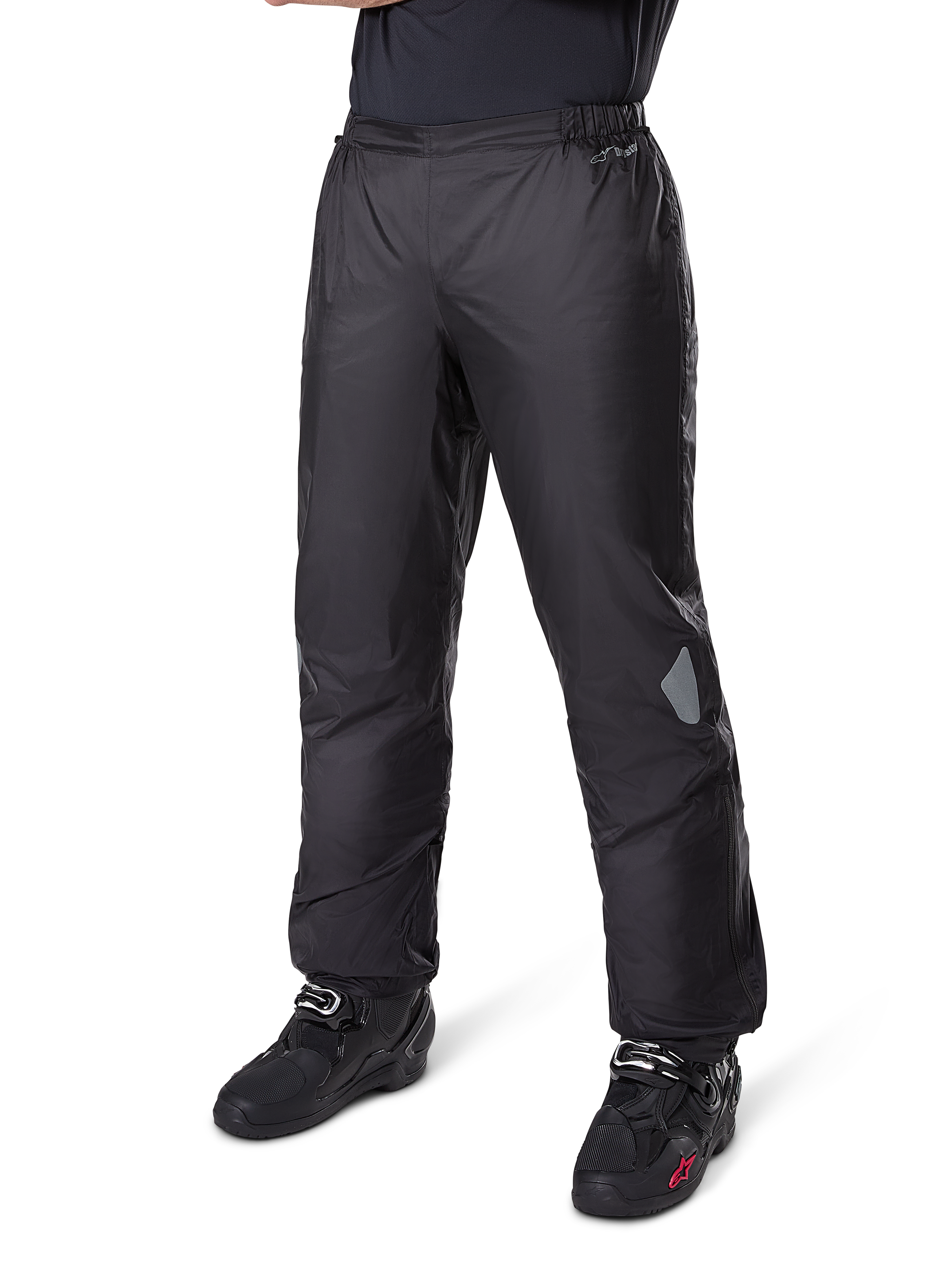 Alpinestars Bogotá Pro Drystar® 3 Seasons Pants, Adventure Touring Motorcycle Pants, Black, worn with black riding boots, featuring reflective patches on the knees and Drystar branding, lightweight waterproof textile design for all-season riding.