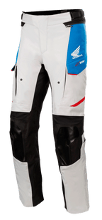 Alpinestars Honda Andes V3 Drystar® Pants, Motorcycle Touring Pants, Ice Gray with Blue panels and Bright Red accents, featuring black reinforced knees and inner leg panels, zippered ventilation ports on thighs, Honda wing logo, waterproof adventure gear