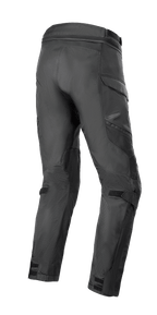 Pantalones Alpinestars Andes Air Drystar®, pantalones de moto, negro, vista trasera que muestra amplios paneles de malla para el flujo de aire, bolsillos cargo y correas de velcro ajustables en las pantorrillas y los tobillos, construcción textil duradera para turismo de aventura