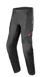 Pantalones Alpinestars Andes Air Drystar®, pantalones de moto para turismo de aventura, negros, con amplios paneles de malla para ventilación, logotipo de estrella roja en el muslo izquierdo, correas de cintura ajustables y secciones de rodilla reforzadas, diseñados para la comodidad en el turismo.