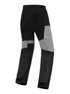 Pantalones Alpinestars Stella Andes V4 Drystar®, pantalones de moto de aventura para mujer, negro y gris oscuro, vista trasera con paneles grises en la parte posterior de las piernas, refuerzos duraderos de ripstop en el asiento y zonas elásticas para movilidad en un diseño textil impermeable