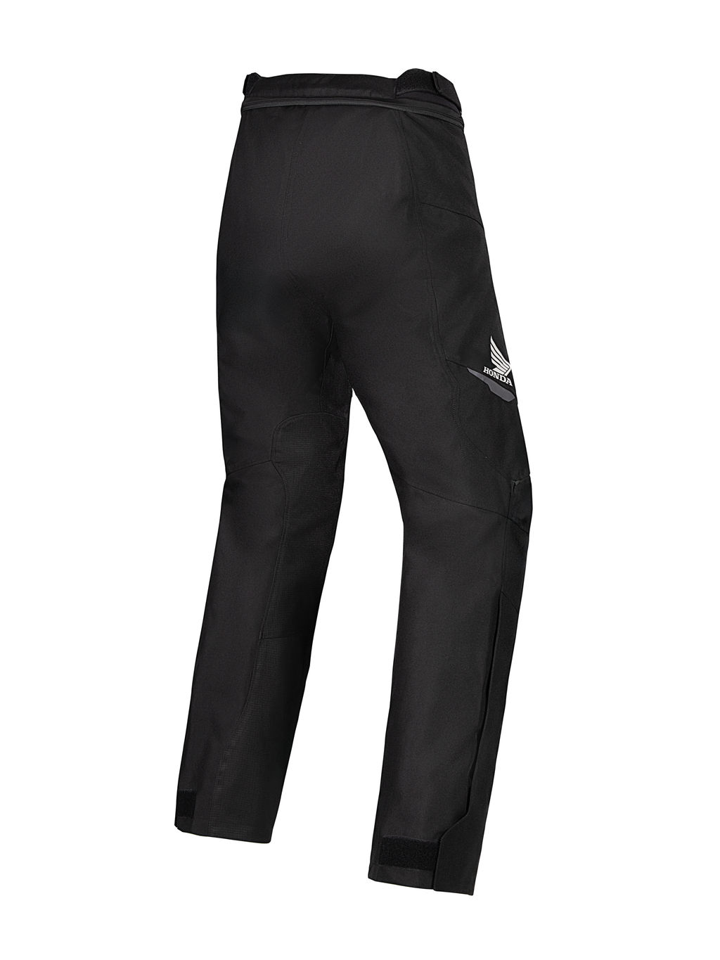 Alpinestars Honda Woman Stella St-1 Waterproof Pants, pantalones de moto negros, vista trasera en tres cuartos con el logotipo del ala de Honda en blanco en el muslo derecho, construcción textil resistente con rodillas articuladas y ajustadores en los tobillos, diseñados para conducción de turismo y aventura