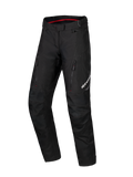 Alpinestars Honda Stella ST-1 Waterproof Pants, pantalones de motociclismo touring para mujer, negros con forro interior de la cintura en rojo, dos bolsillos verticales con cremallera en los muslos, logotipo de Alpinestars en la pierna, equipamiento de aventura de tejido duradero