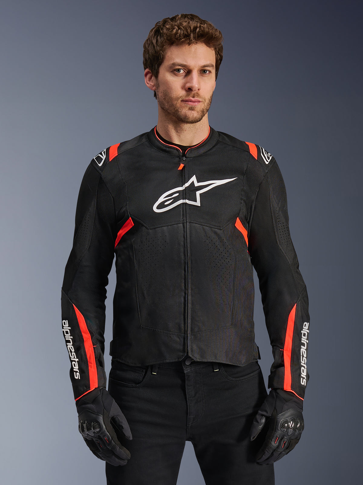 Alpinestars T-SPS Air V2, chaqueta de moto para hombre, negra y roja flúor, con paneles de malla técnica transpirable.