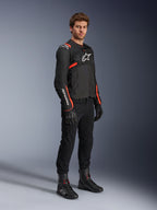 Chaqueta Alpinestars T-SPS Air V2, chaqueta de moto textil para hombre, negra y roja flúor con paneles de malla ventilada.