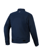 Chaqueta Alpinestars Bruiser, chaqueta de moto urbana, azul oscuro, vista trasera con construcción de sarga de polialgodón elástico, pequeño logo blanco en la nuca, ojales de ventilación en las mangas y pestañas de ajuste en la cintura.