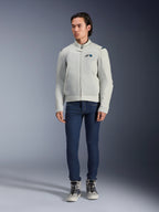 Alpinestars Circal-1 Air Jacket, Metal Gray, urban motorcycle jacket with mesh airflow panels, worn by a model with blue jeans and gray riding sneakers, minimalist design for sustainable city riding.