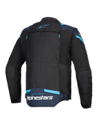 Chaqueta de moto Alpinestars T-Stunt Air, negro, azul oscuro y azul brillante, vista trasera que muestra un gran panel modular con cremalleras, logotipo de Alpinestars y texto 'Racing Ahead' en la parte inferior de la espalda.