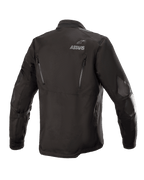 Alpinestars Venture XT Jacket, negra, vista posterior de una chaqueta de moto textil para turismo de aventura, con el logotipo ASTARS en el hombro, cremalleras de ventilación verticales en la espalda y refuerzos de película de PU en los brazos