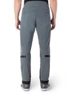 Alpinestars Alden Pants, Urban Gray, vista trasera de pantalones de moto urbanos para hombre, corte ajustado bajo la rodilla con correas de ajuste negras en las pantorrillas, diseño de cintura alta con el logotipo MO.ST.EQ. en el canesú trasero, usados con calzado de conducción gris