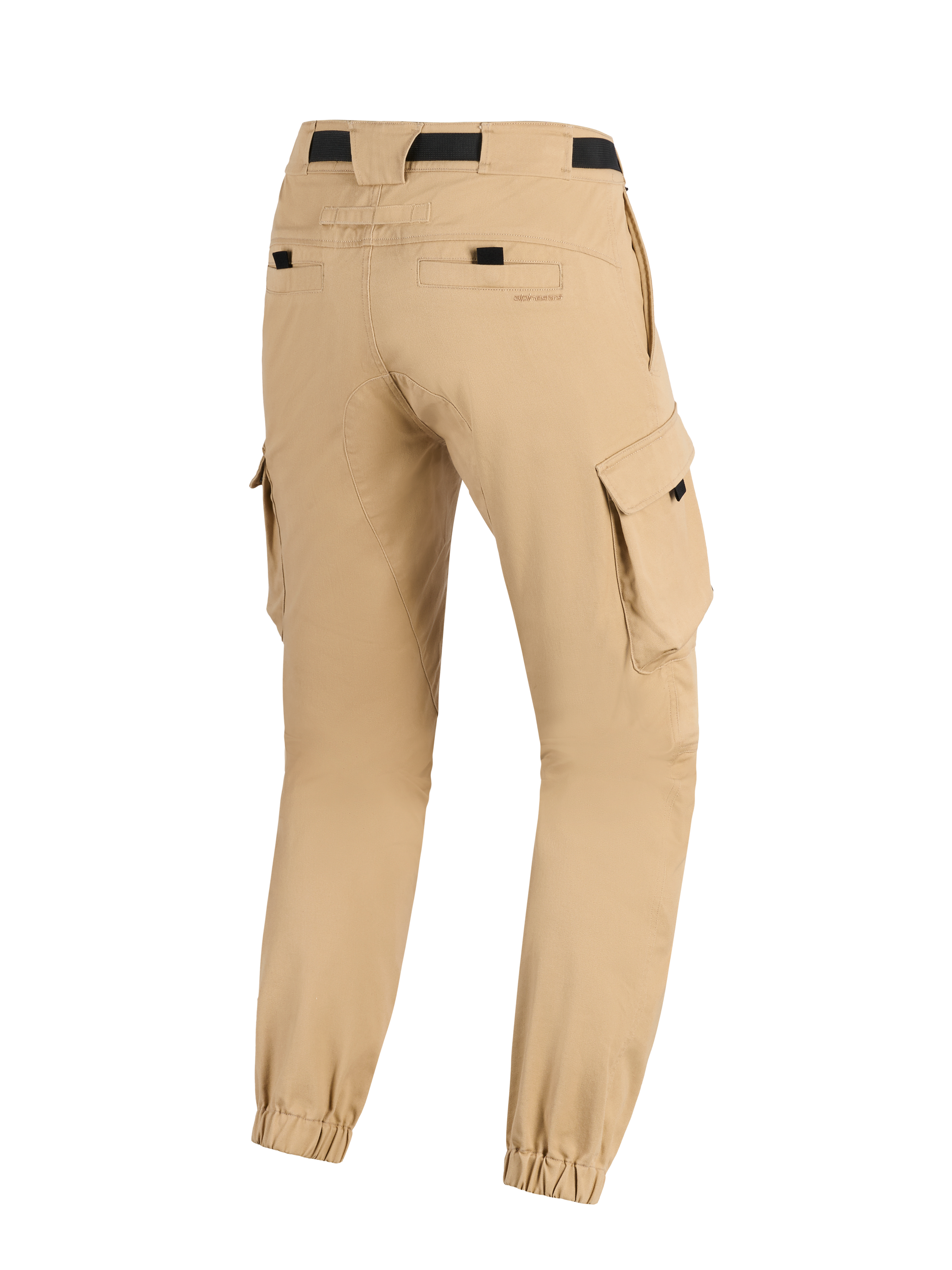 Alpinestars Flex-AST Cargo Pants, beige claro, pantalones de moto, vista trasera que muestra las piernas cónicas con dobladillos elásticos, bolsillos cargo laterales y correa negra en la cintura, diseño de inspiración militar urbana