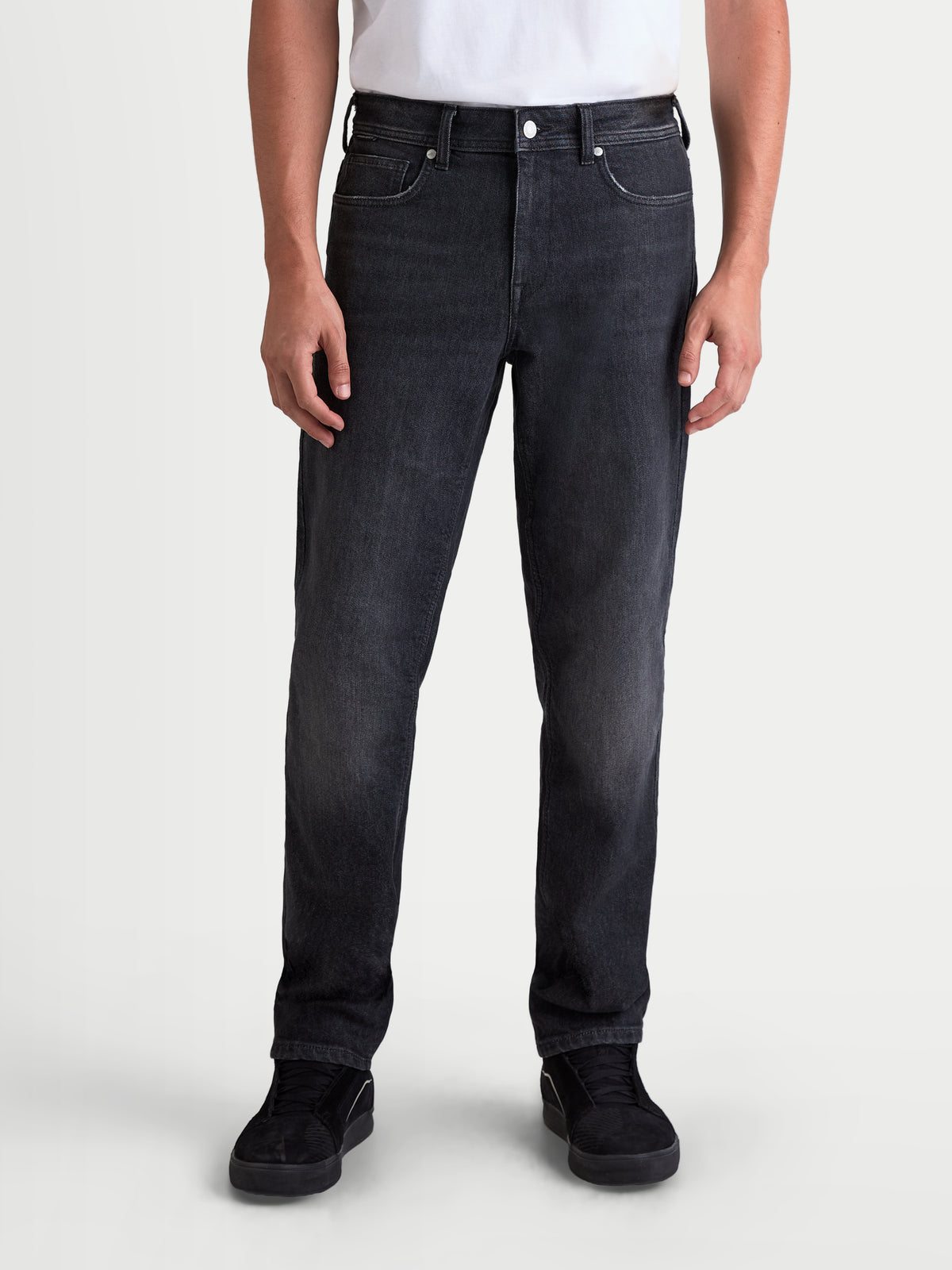 Alpinestars Flex-AST 8 Denim Pants, men's urban motorcycle riding jeans in used black, front view on a model wearing casual everyday apparel, AA certified single-layer stretch denim with protective features