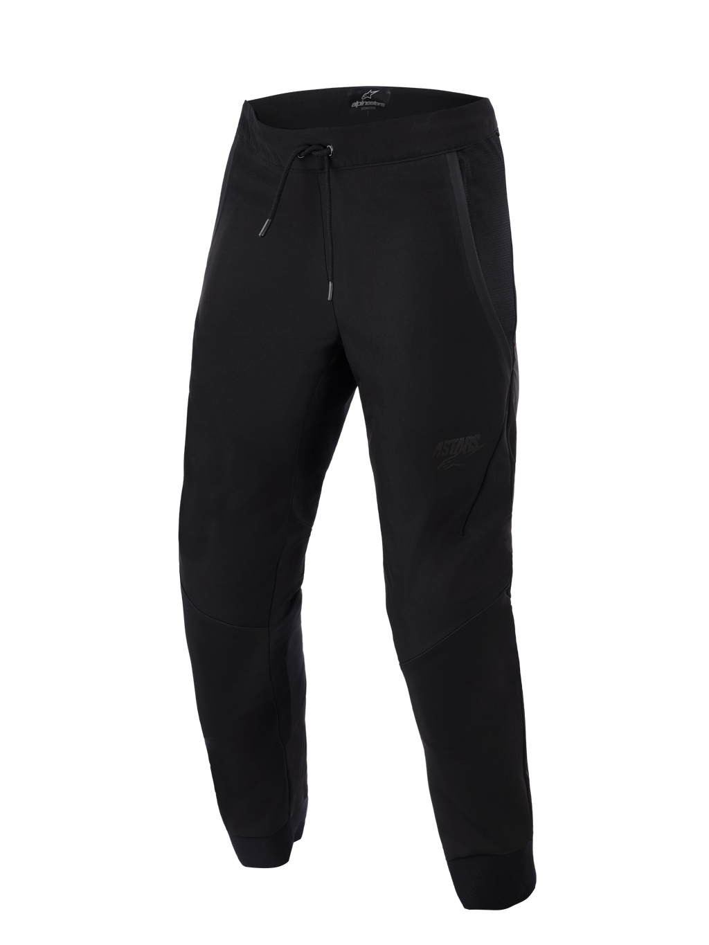 Pantalones Alpinestars Aeroshell Airflow, negros, pantalones ligeros de motociclismo para deporte y turismo, con amplios paneles de malla para ventilación, cintura elástica con cordón, piernas precurvadas y un sutil logotipo tonal en el muslo.