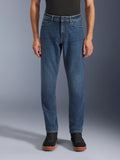 Alpinestars Flex-AST 5 Denim Pants, Urban Motorcycle Jeans, Indigo Washed Blue, front view showing a modern tapered fit and casual five-pocket styling, worn with a black top and sneakers, designed for urban riding comfort and protection.