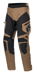 Alpinestars Venture XT Pants Over Boot, Adventure Touring Motorcycle Pants, Camel and Black, featuring reinforced knee and thigh panels, side cargo pocket with Alpinestars logo, and adjustable waist strap.