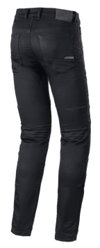 Alpinestars Cerium Tech Stretch Riding Denim, pantalones vaqueros para motociclismo, Black Rinse, diseño de corte ajustado, vista trasera que muestra la construcción de pierna precurvada, bolsillos traseros y parche de cuero en la cintura con marca grabada