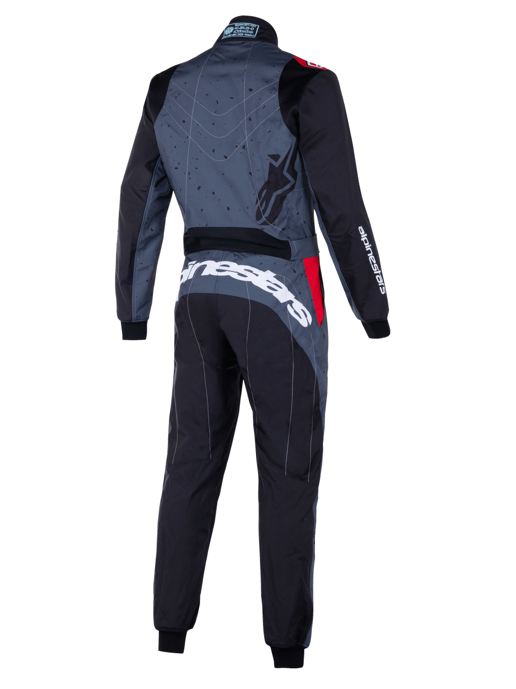 Mono Alpinestars KMX-9 V3 Graphic 6, traje de karting en gris y negro con detalles rojos, vista trasera con espalda de diseño gráfico, marca Alpinestars en blanco llamativo en la parte inferior de la espalda y paneles ergonómicos para el rendimiento en deportes de motor.