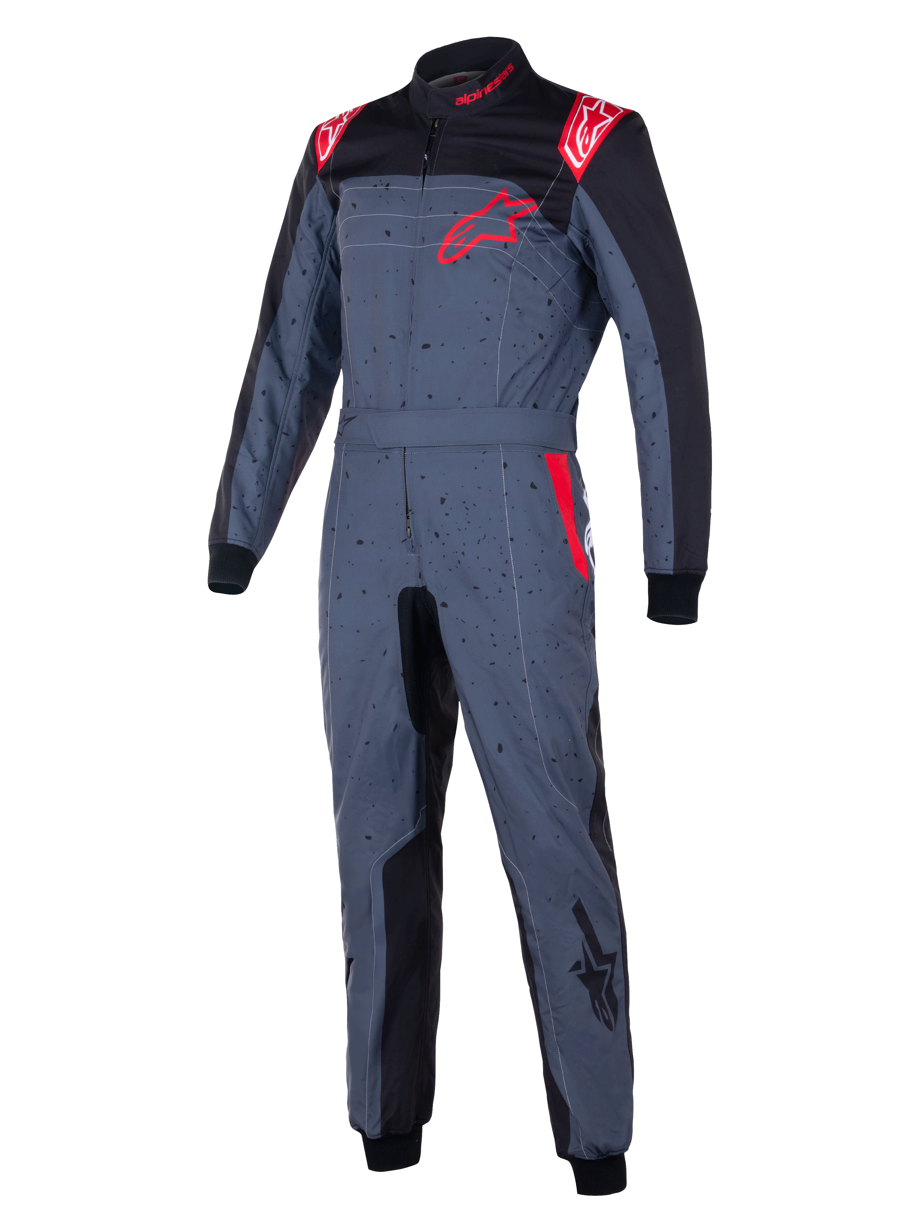 Alpinestars KMX-9 V3 Graphic 6, mono de karting, gris antracita con detalles en negro y rojo, con un diseño gráfico moteado, logotipo de estrella roja en el pecho, paneles interiores negros y detalles rojos en los hombros, equipamiento profesional para automovilismo