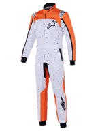Alpinestars KMX-9 V3 Graphic 6 Suit, mono de karting, blanco, naranja y negro, con un patrón de salpicaduras negras, logotipos de Astar en el pecho y la pierna, puños de punto y cinturón ajustable, diseñado para la protección en carreras de karting