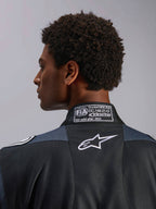 Alpinestars Traje GP Pro Comp V2 - FIA, traje de automovilismo para hombre, negro y asfalto, con certificación FIA 8856-2018 y logotipo Astar blanco.
