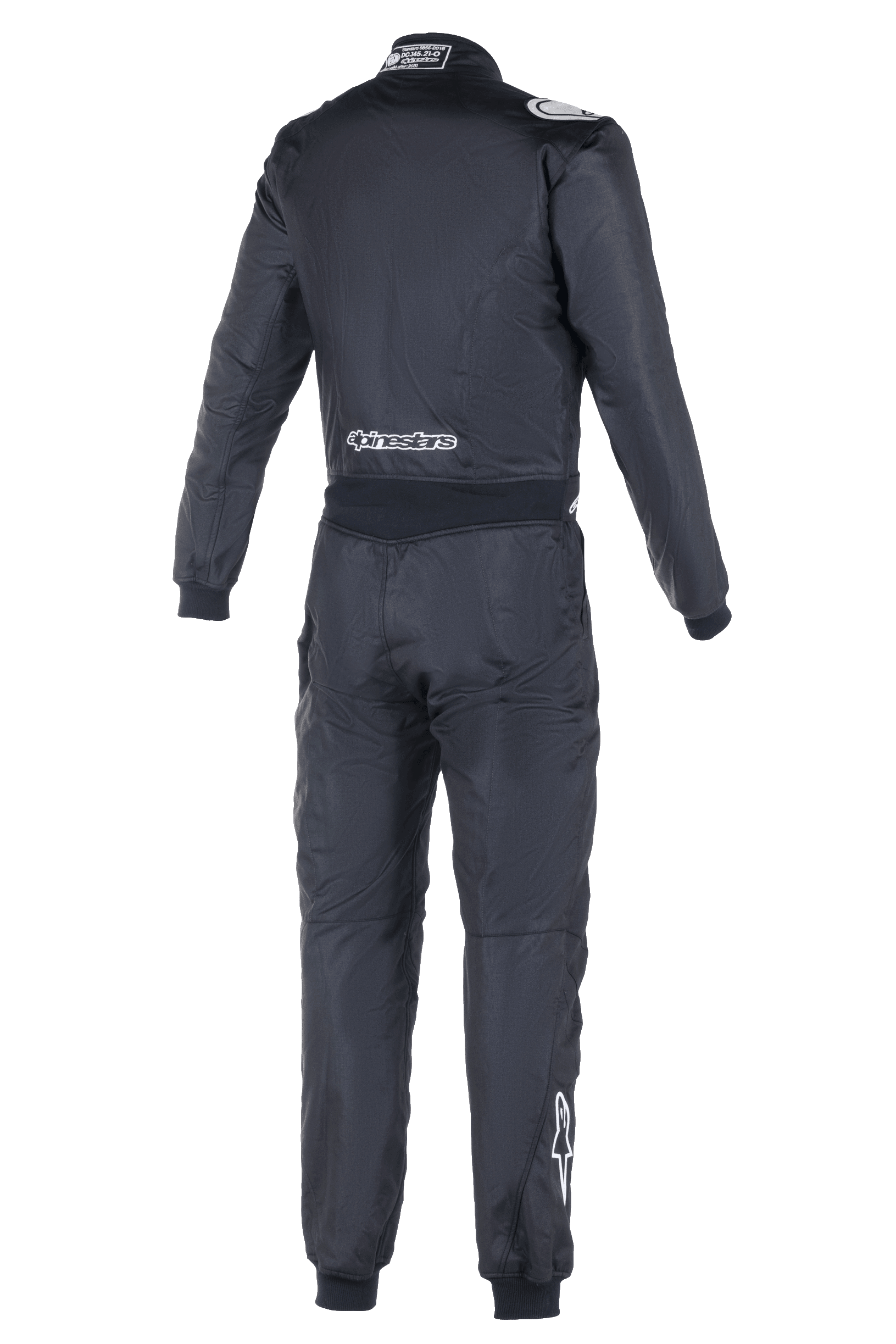 Mono Alpinestars Atom FIA, traje de carreras de automovilismo, vista posterior en negro, con logotipos blancos de Alpinestars en la parte inferior de la espalda y la pantorrilla derecha, etiqueta de homologación FIA en el cuello, construcción textil de una pieza para seguridad profesional en el automovilismo